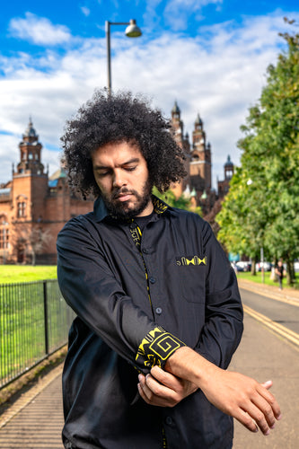 Yellow on black tribal abstract print shirt